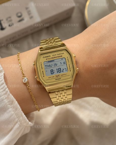 Złoty zegarek cyfrowy Casio z krokomierzem i Bluetooth | ABL-100WEG-9AEF